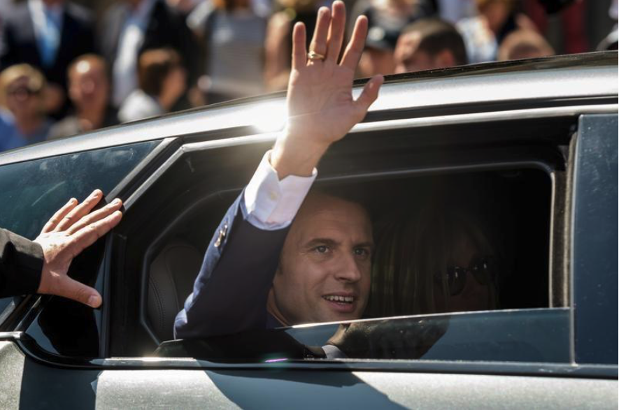 Emmanuel Macron, French President leaves the polling station after voting in the first of two rounds of parliamentary elections in Le Touquet, France, June 11, 2017.