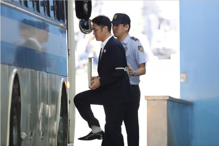 Lee Jae-yong, Samsung Group heir, leaves after his verdict trial at the Seoul Central District Court in Seoul, South Korea August 25, 2017.