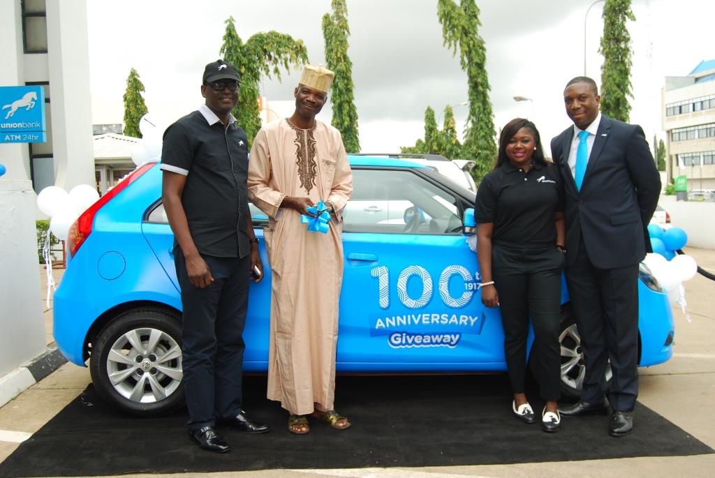 Alu, a customer from Minna receiving his car gift