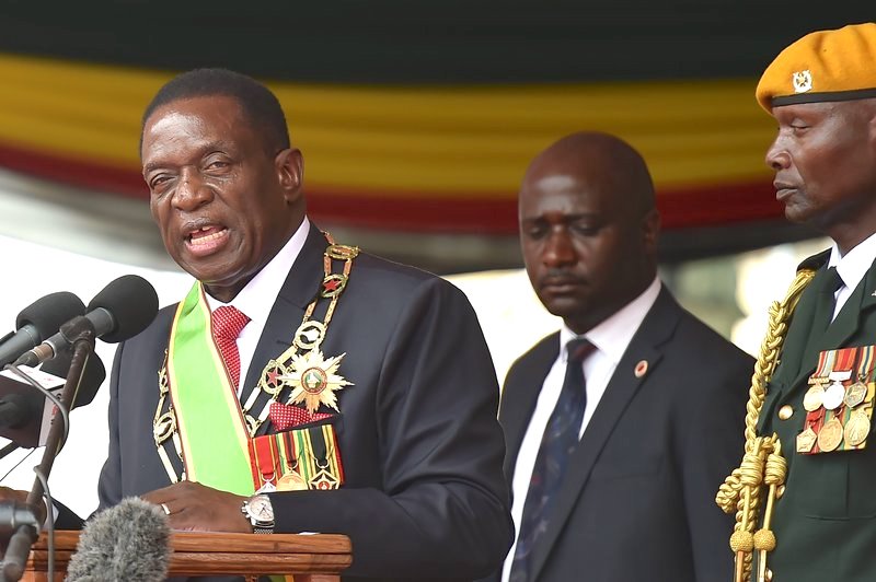 Zimbabwe's new interim President Emmerson Mnangagwa gives an address after his swearing-in ceremony in Harare on Friday, marking the final chapter of a political drama that toppled his predecessor Robert Mugabe after a military takeover.