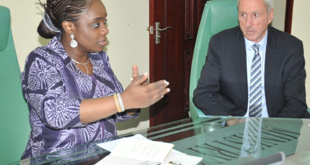 Kemi Adeosun, Minister of Finance, discussing with the Chief Executive Officer of Vlisco Group, David Suddens, during a visit by a delegation from the company to the Minister on Tuesday in Abuja.