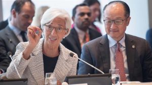 Christine Lagarde, International Monetary Fund (IMF) Managing Director speaks as World Bank President Jim Yong Kim listens at the Carbon Pricing Leadership