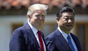 President Donald Trump and Chinese President Xi Jinping walk together after a meeting