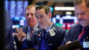 Wall Street edges lower after conflicting signals on trade