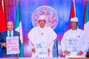 CBN insists on cashless economy as Buhari unveils new naira notes