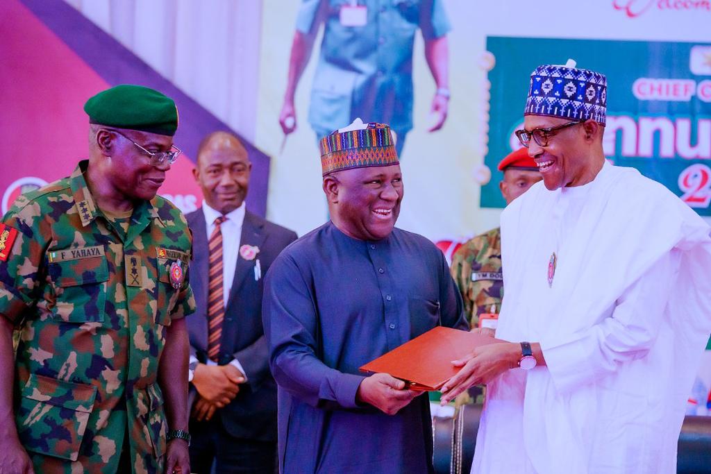Buhari presents award to BUA chairman,Rabiu on behalf of Nigerian military 